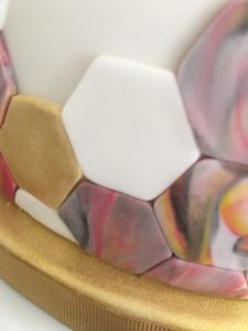 marbled and gold painted sugarpaste hexagons